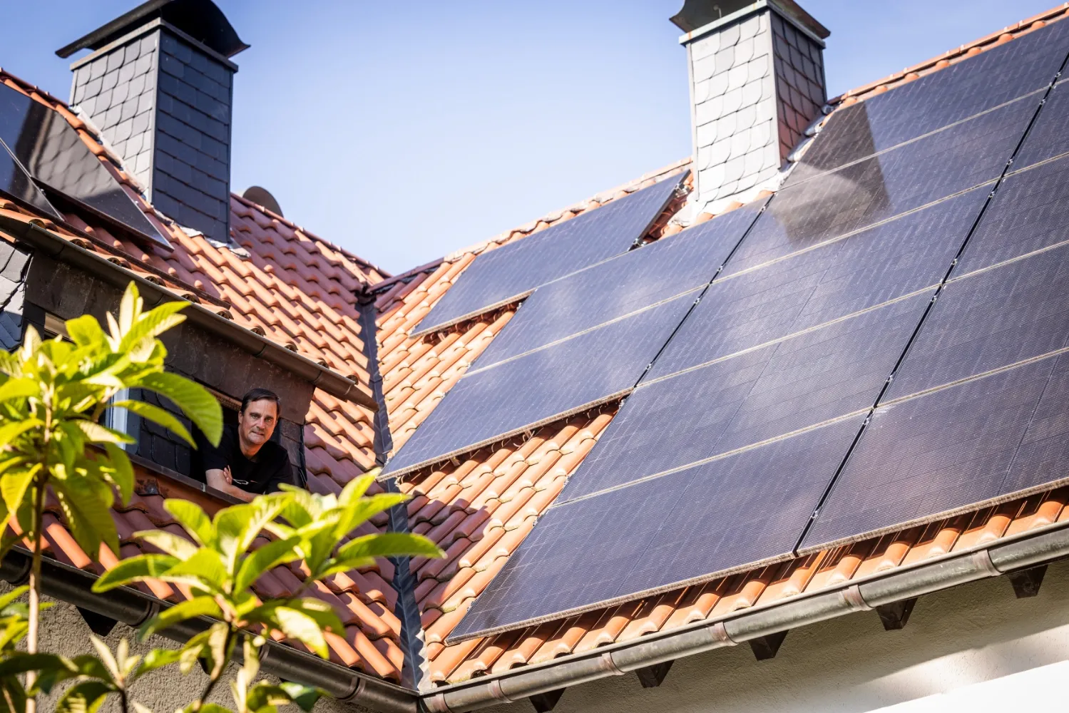Olaf in the roof window with PV system